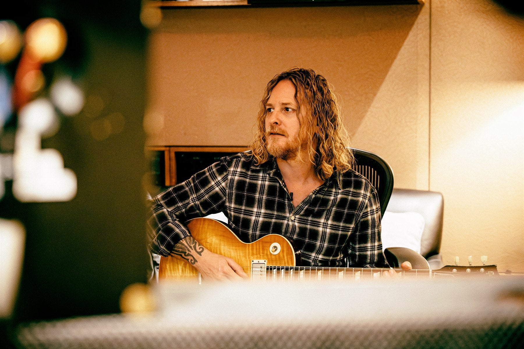 Justin Derrico listening back in the control room